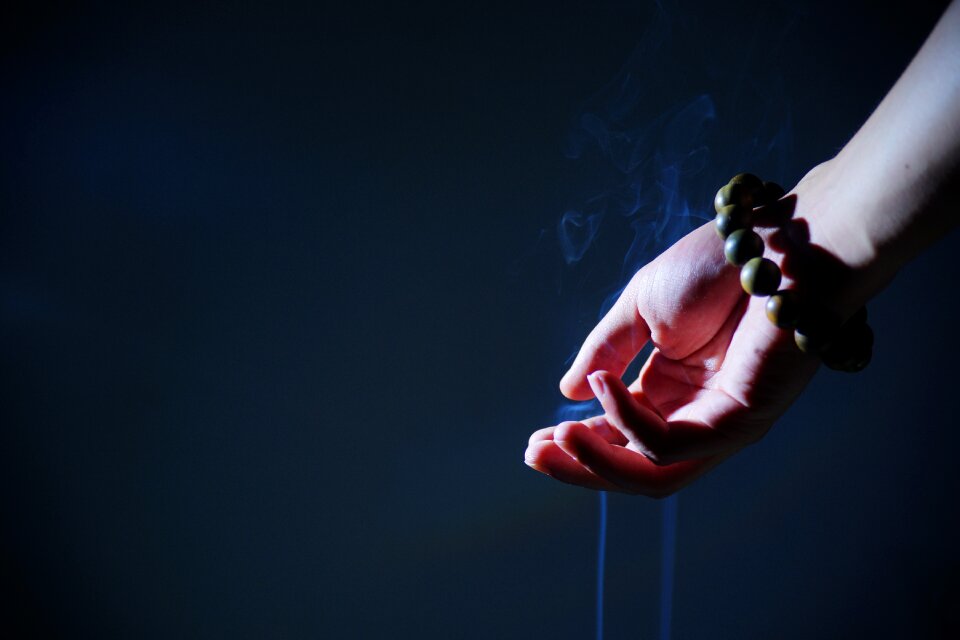Buddhist prayer beads smoke zen