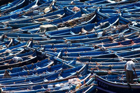 Boats in the harbor blue boats fisherman