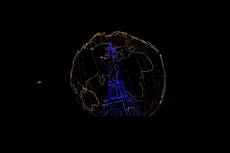 Image of Eiffel Tower With Illuminated Globe honors the CO… 