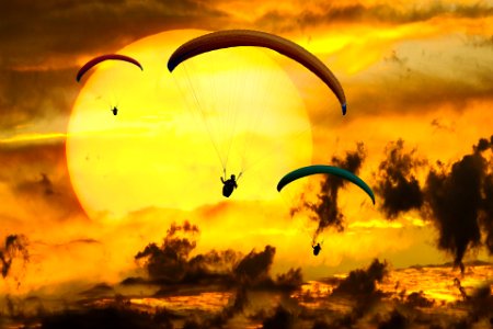 Paragliding on sunset photo