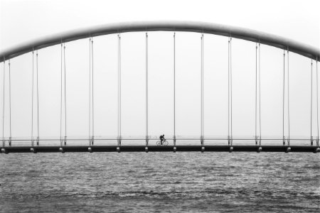 Bicycle riding on bridge 