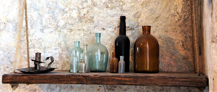 Holder old vintage bottles