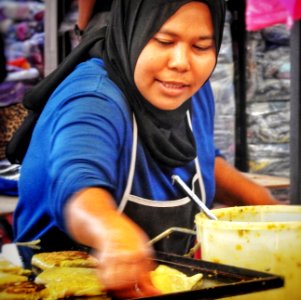 Vendor at Night Market photo