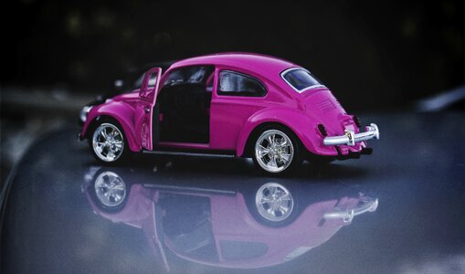 Pink vintage vw beetle photo