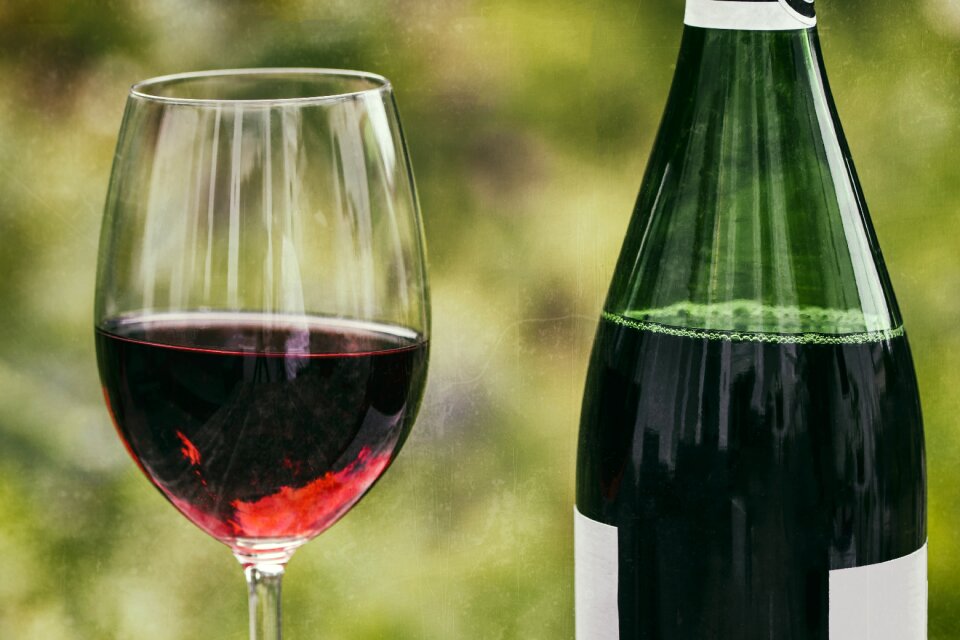 Wine bottle red wine glass