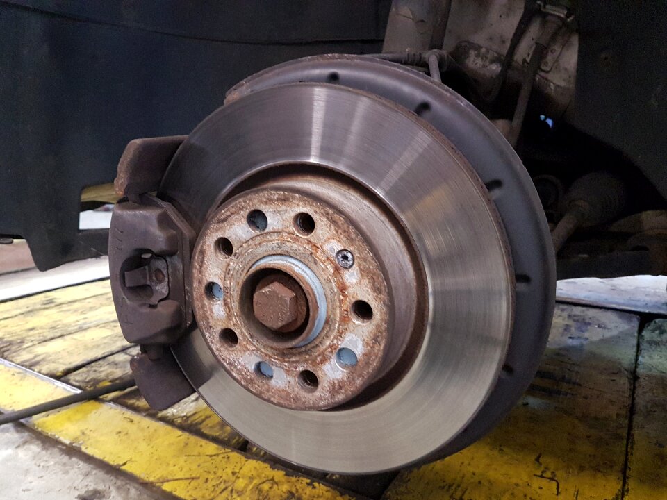 Brake disc wheel replacement car mechanic