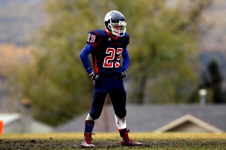 American football player football field uniform photo