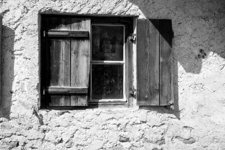 Wooden shutters facade window glass