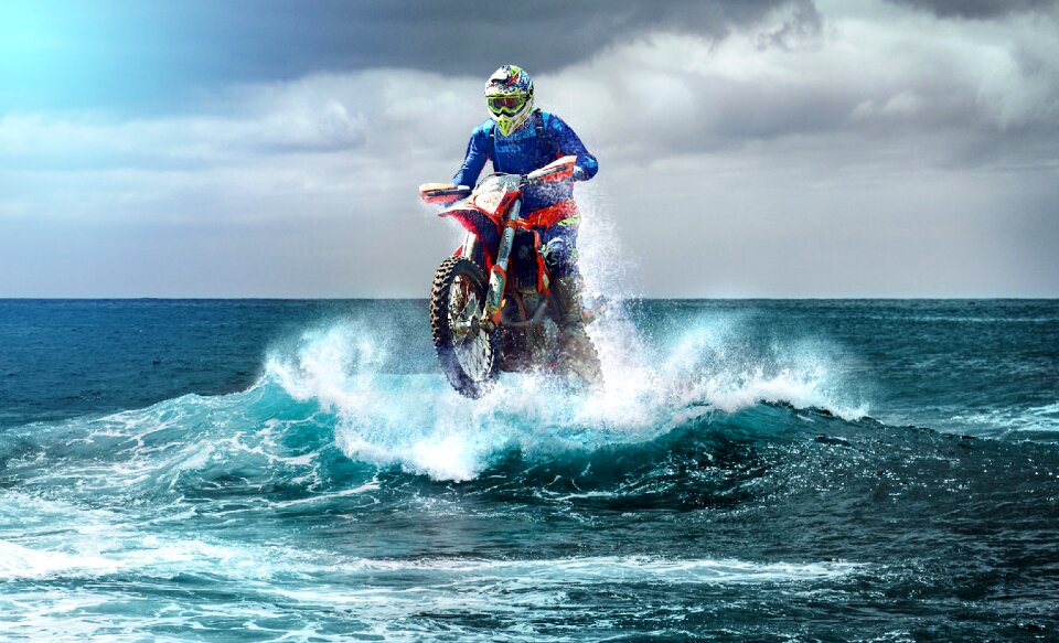 Surfers racing motocross ride