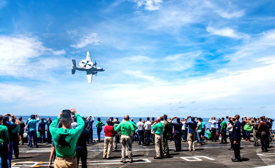 The ship and its carrier strike group are transiting home …