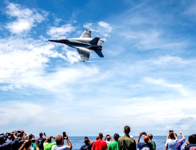 The ship and its carrier strike group are transiting home …