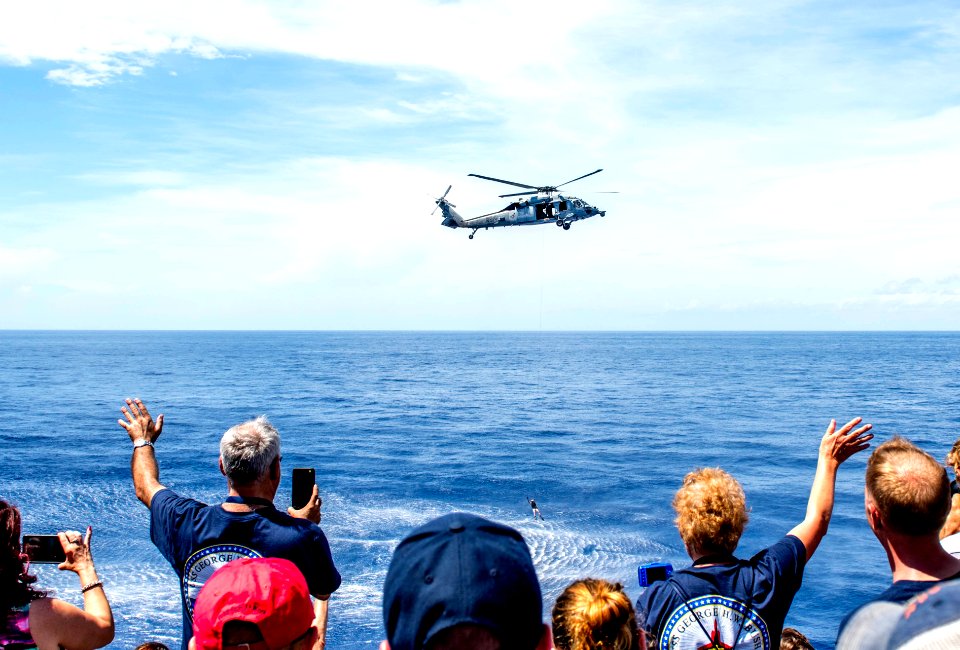 The ship and its carrier strike group are transiting home …