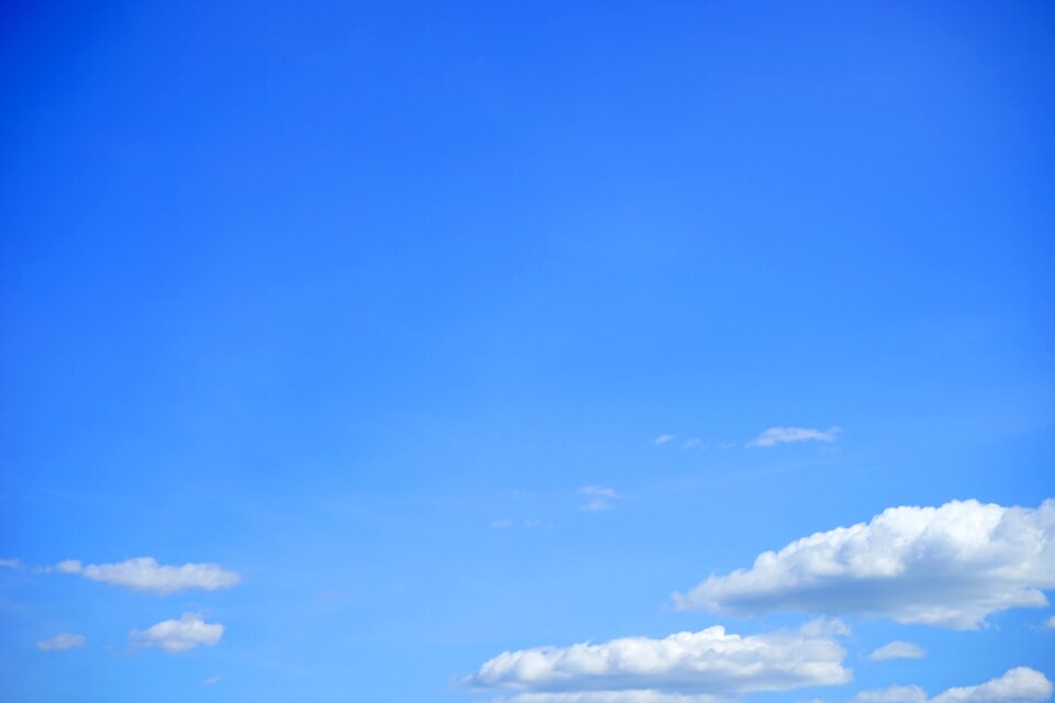 Blue white clouds form photo