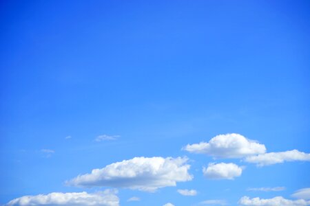 Blue white clouds form photo