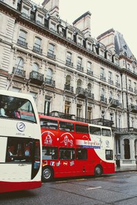 Double decker traffic street scene photo