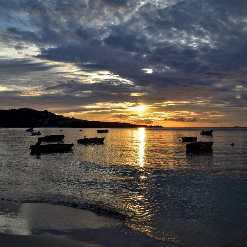 Seascape boats heavy clouds photo