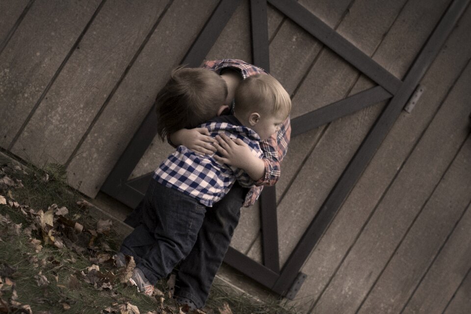 Boy together children