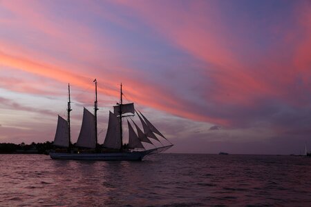 Sunset sea sailing ship