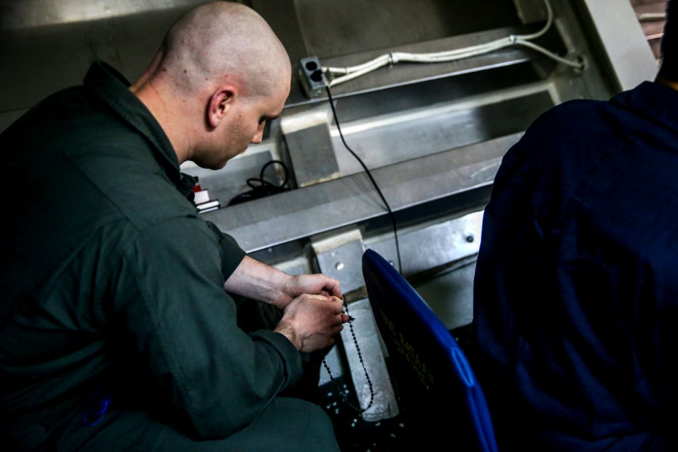 Sunday service aboard USS Bataan
