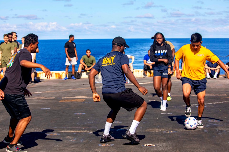 Sailors and Marines take aprt in a steel beach picnic