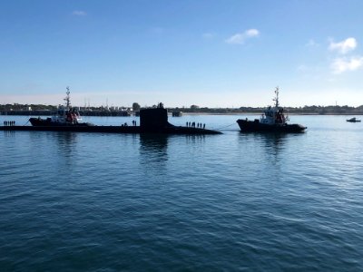 USS John Warner (SSN 785) conducted a brief stop for perso…