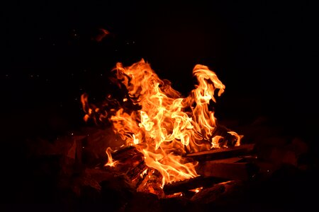 Campfire flame embers photo
