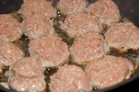 Pork meatballs frying