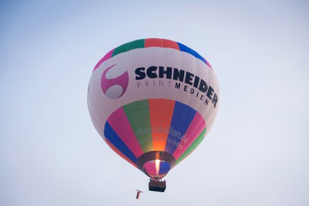 Hot air balloon ride advertising flying