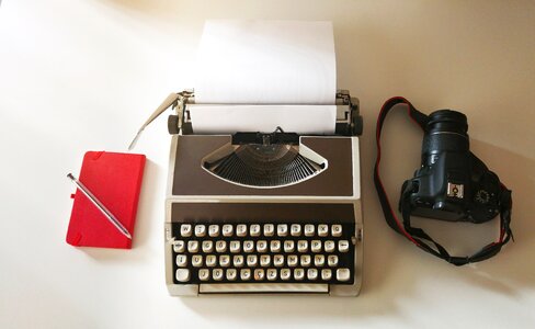 Paper pen typewriter photo