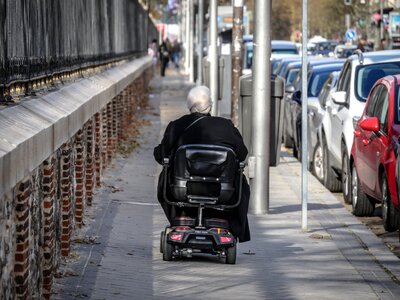 Elderly woman chair of wheels old age