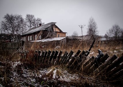 Old house fence the destruction of photo