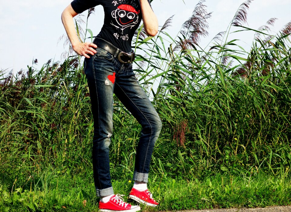 Woman jeans sneakers