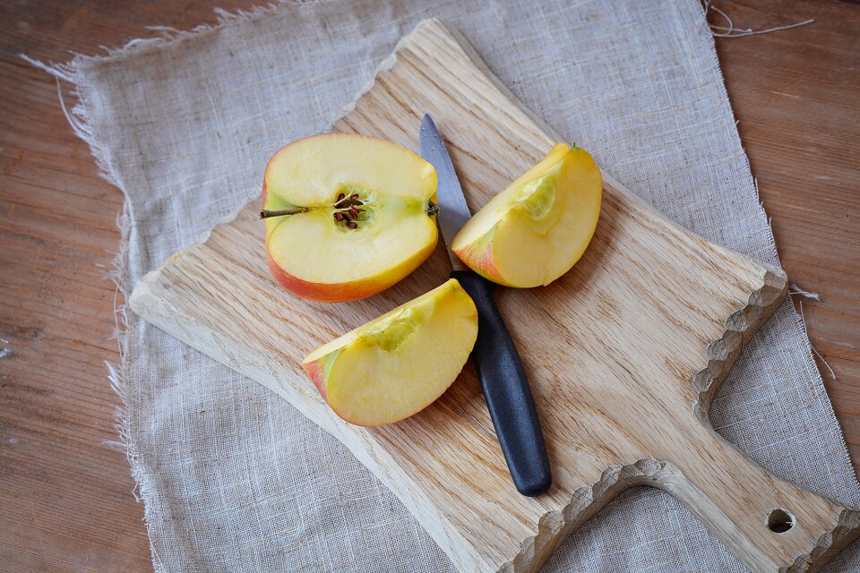 Sliced apple wooden board cutting board