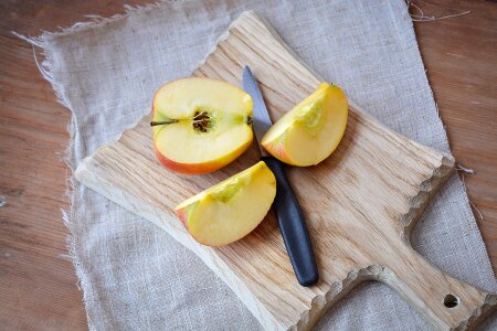 Sliced apple wooden board cutting board photo