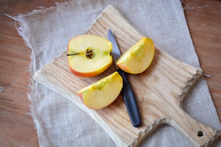 Sliced apple wooden board cutting board
