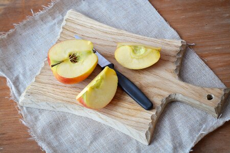 Sliced apple cutting board wooden board