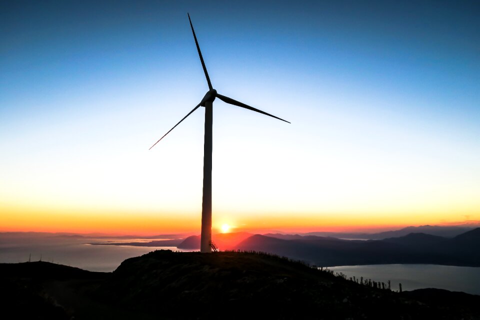 Silhouette sunset wind turbine