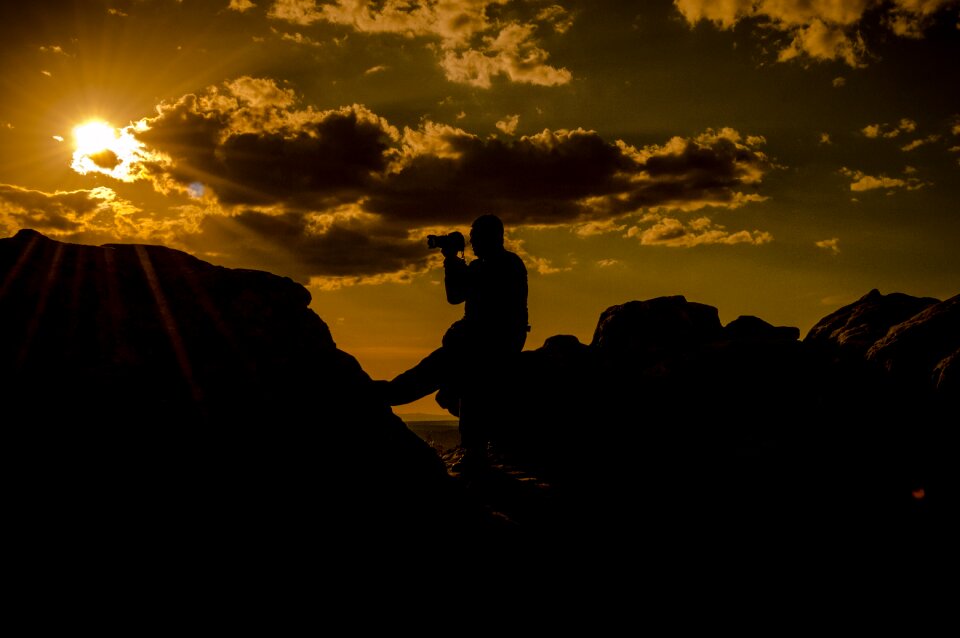 Red clouds mountains black sunset