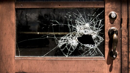 Damaged window crime photo