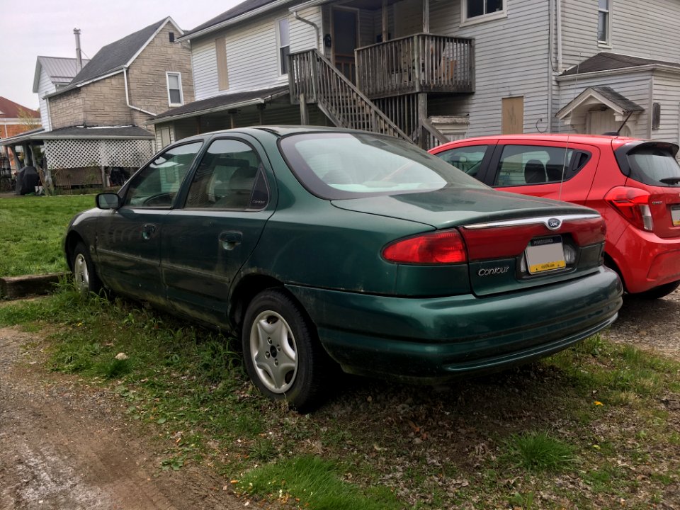 2000_Ford_Contour,_rear_left,_4-24-2021