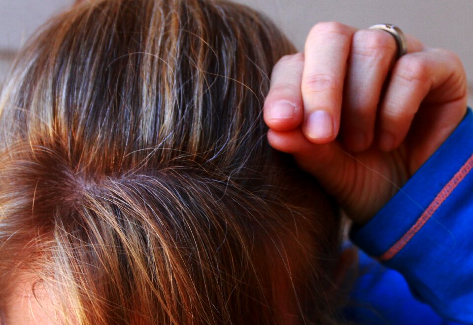 Blond hair plucking hair old