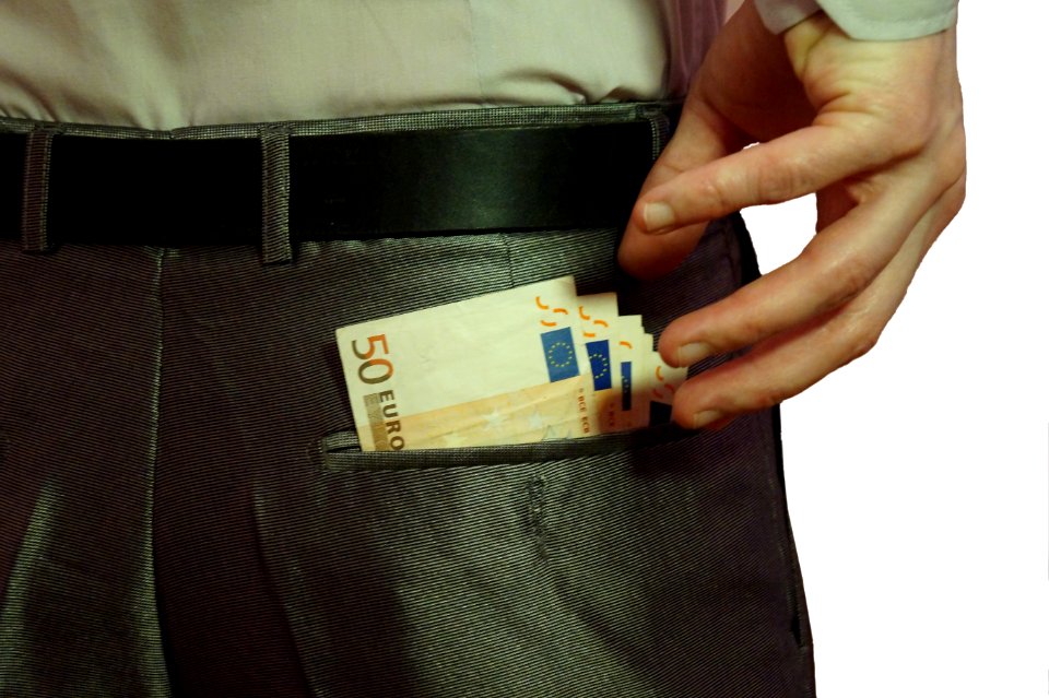 11_-_Corruption_-_white_background_-_euro_notes_in_back_pocket_with_hand_-_royalty_free,_without_copyright,_public_domain_photo_image