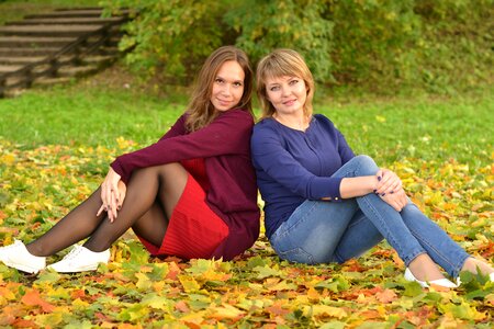 Women sitting on the ground posture photo