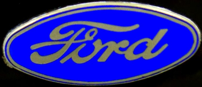 "Ford"_hood_ornament,_from-_1929_Ford_Model_AA_Depot_Hack_-_Automobile_Driving_Museum_-_El_Segundo,_CA_-_DSC01878_(cropped)