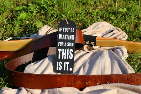 Motto wooden sign leather