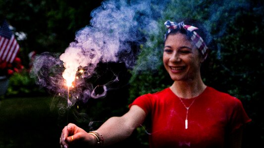 Smoke sparkler woman