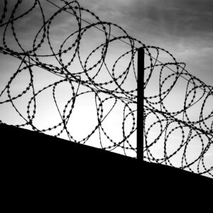 Barbed wire black the night sky photo