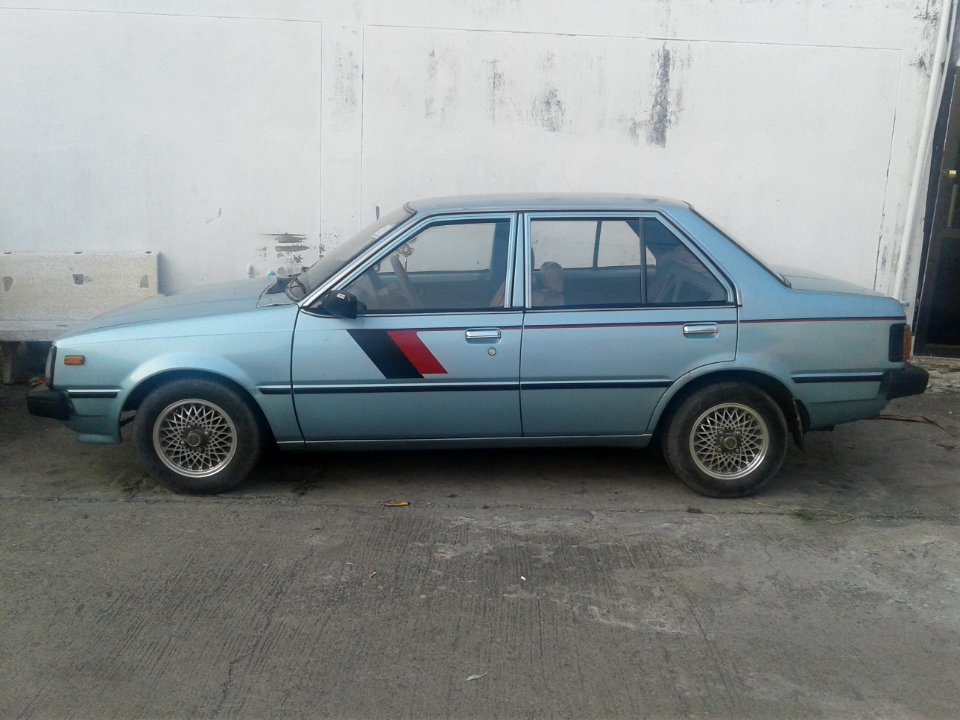 1982-1983_Nissan_Sunny_FF_(B11)_1.5_GL_Sedans_02