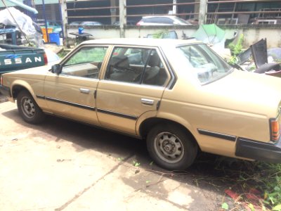 1982-1983_Toyota_Corona_(TT140)_DX_Sedan_(27-07-2018)_02