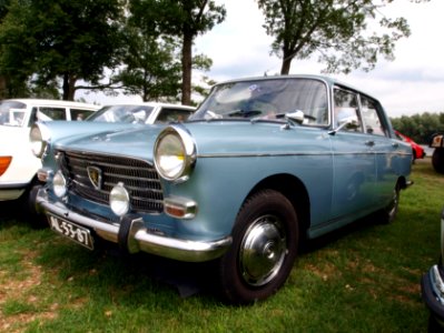 1968_Peugeot_404,_Dutch_licence_registration_AL-53-87_p1